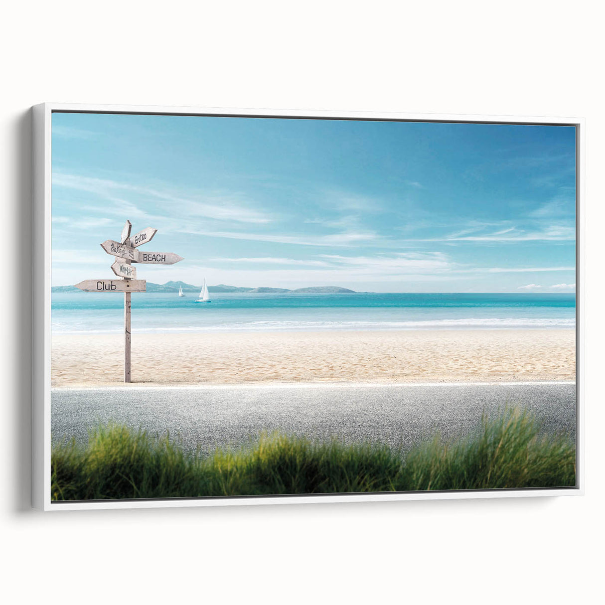 Framed canvas wall art showcasing a serene beach landscape design, featuring vibrant blue skies and gentle waves, presented in a stylish white frame.
