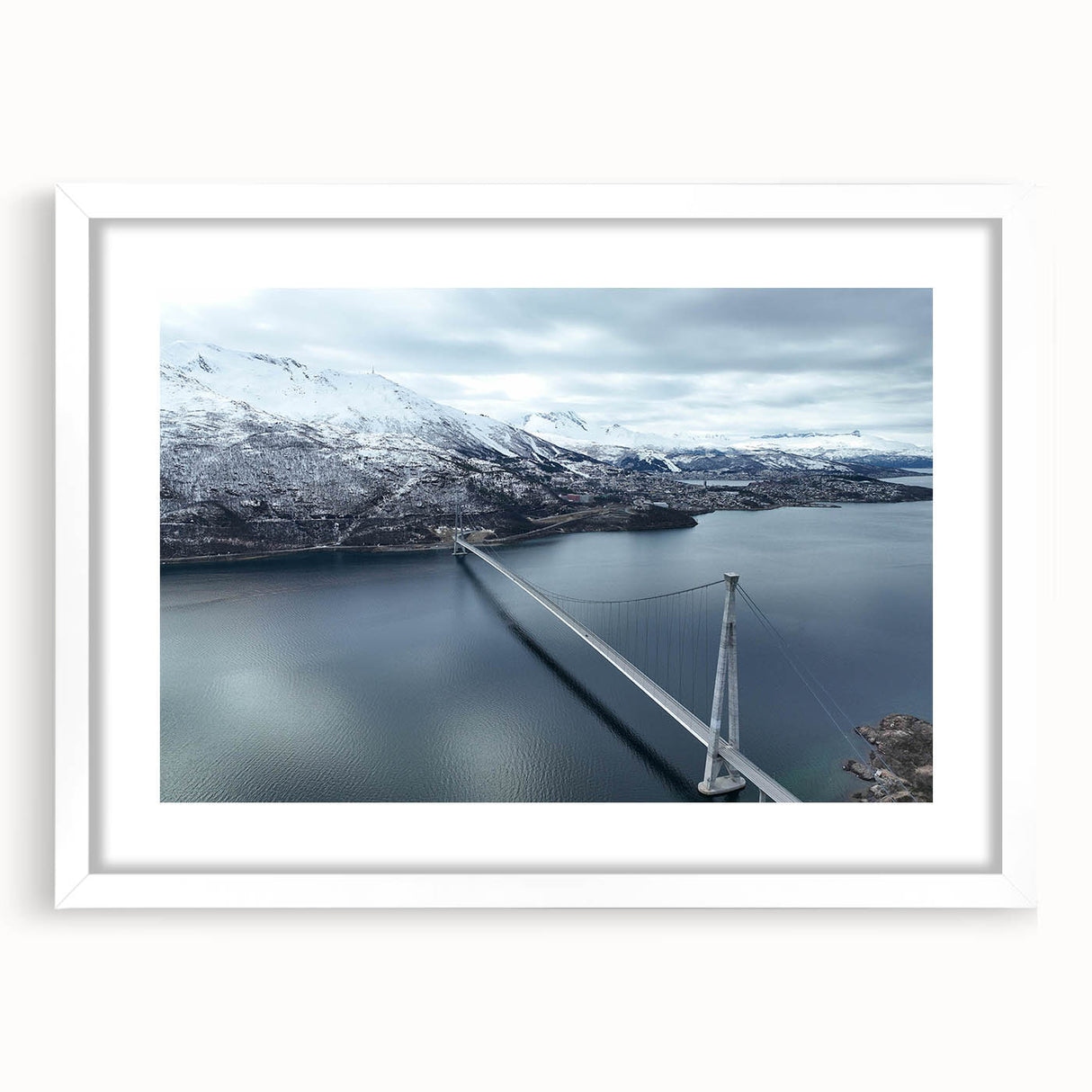 Framed wall art featuring a serene landscape with a bridge, presented in a white mat and frame, perfect for enhancing home decor with nature-inspired aesthetics.