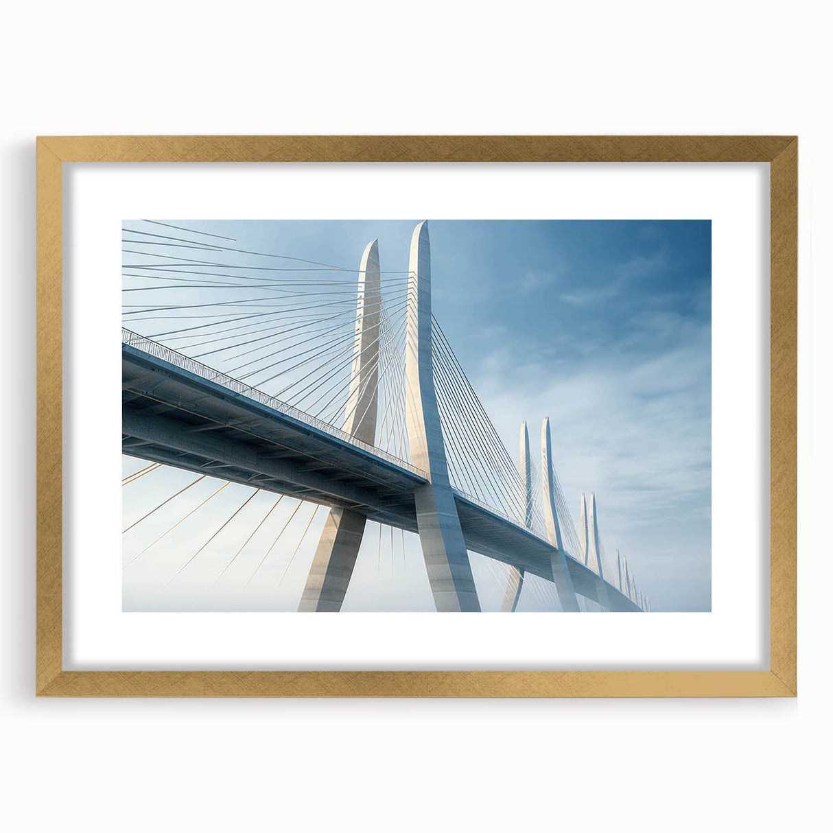 Framed wall art showcasing a serene landscape with a bridge, featuring a gold mat and elegant frame, perfect for enhancing home decor with a touch of nature.