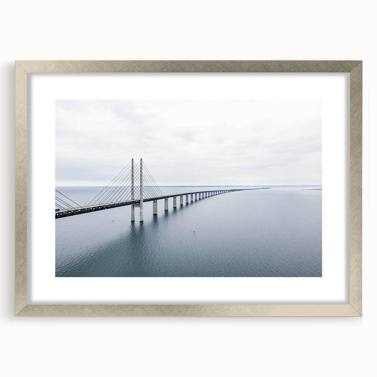 Silver-framed wall art featuring a stunning landscape design of a bridge, elegantly matted for a sophisticated finish, perfect for home decor accents.
