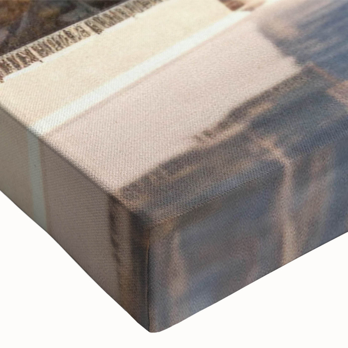 Close-up of a stretched canvas featuring a vibrant landscape design with a medieval castle, showcasing rich colors and intricate details, perfect for home decor.