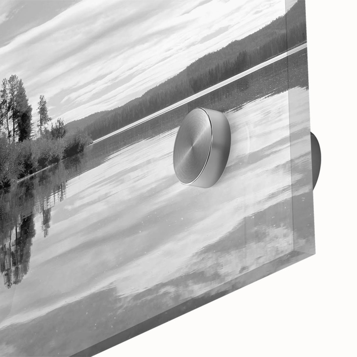 Close-up of a vibrant acrylic glass wall art piece showcasing a serene countryside landscape with lush greenery and a clear blue sky, perfect for home decor.