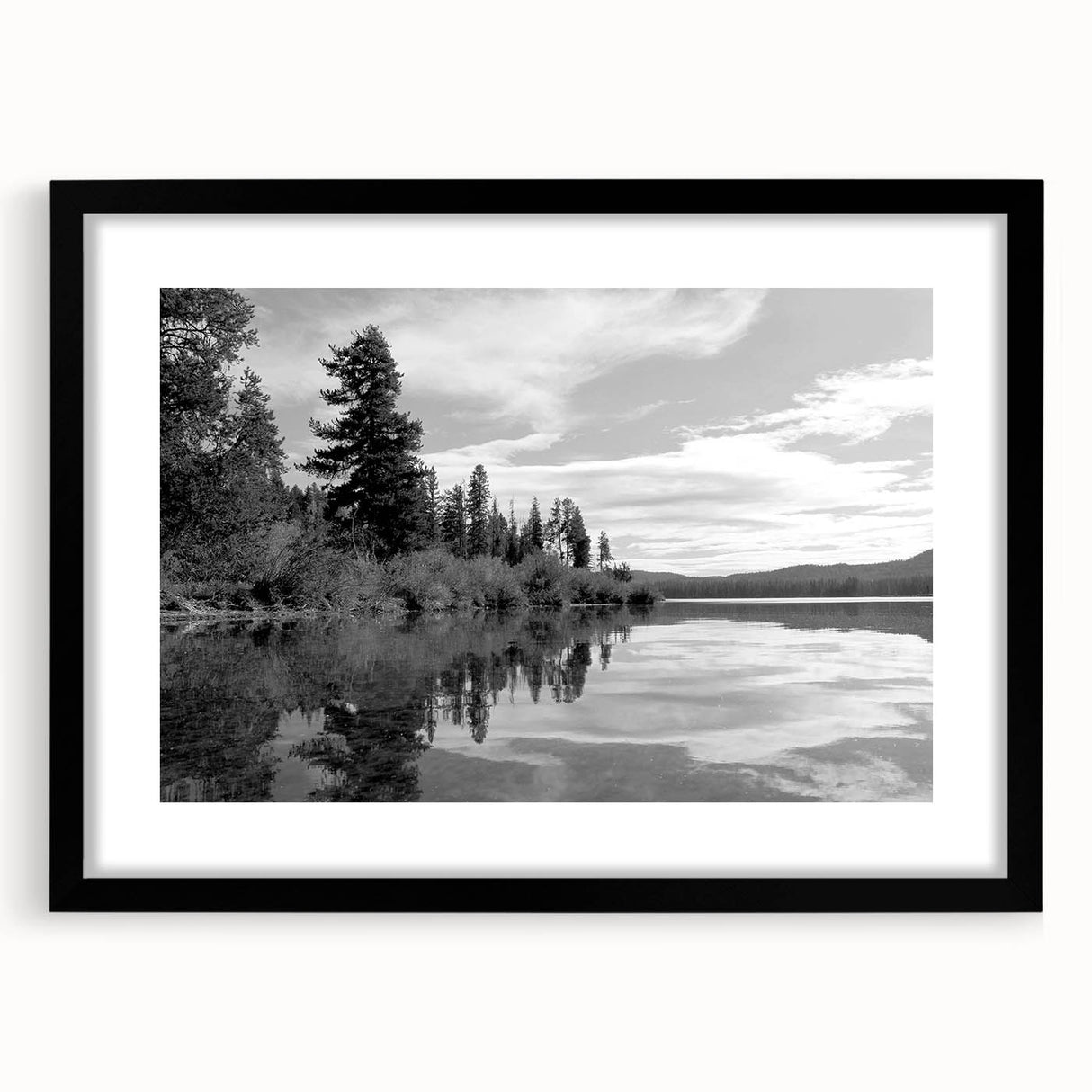 Framed wall art collection of serene countryside landscapes, featuring a black frame and mat, perfect for enhancing home decor with a rustic touch.