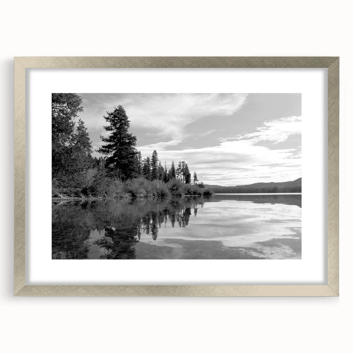 Silver-framed wall art piece showcasing a serene countryside landscape design, featuring vibrant greens and soft blues, perfect for home decor enhancement.