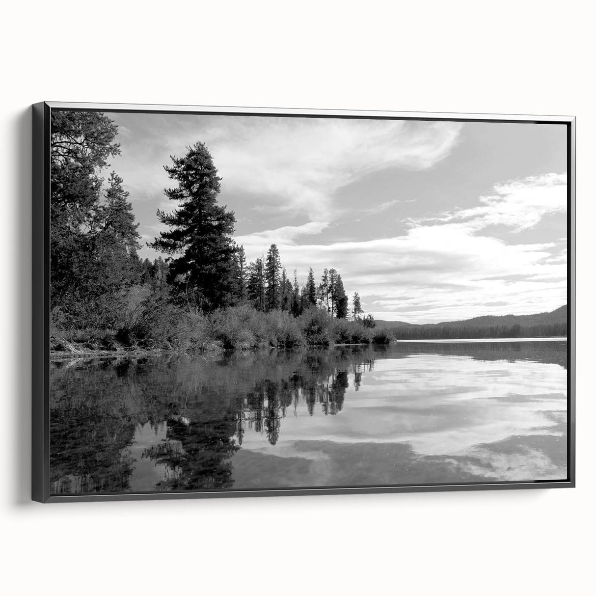 Framed canvas wall art showcasing a serene countryside landscape design, featuring lush green fields and vibrant blue skies with a sleek black frame. Perfect for home decor.