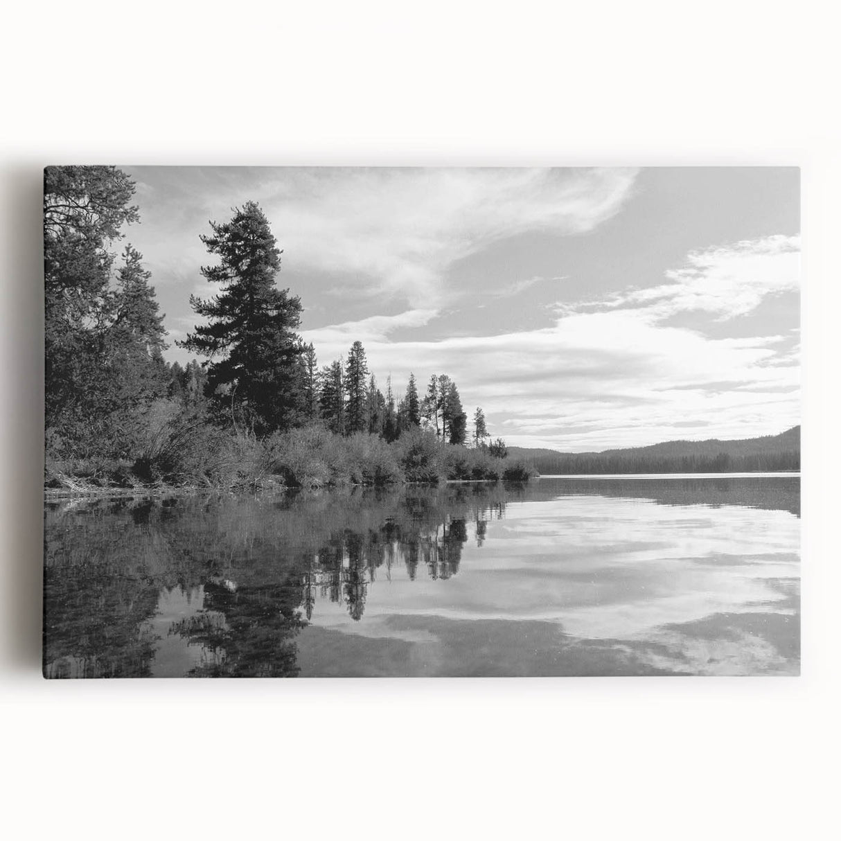 Stretched canvas wall art showcasing a serene countryside landscape with vibrant green fields and a clear blue sky, perfect for home decor.