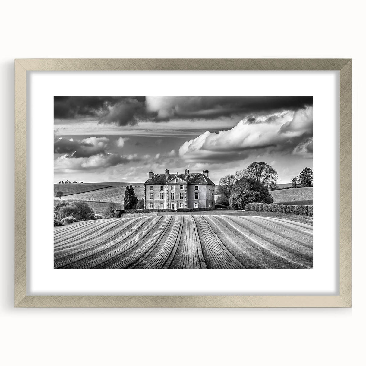 Framed wall art featuring a serene countryside landscape design with a silver mat, showcasing vibrant colors and intricate details, perfect for home decor.