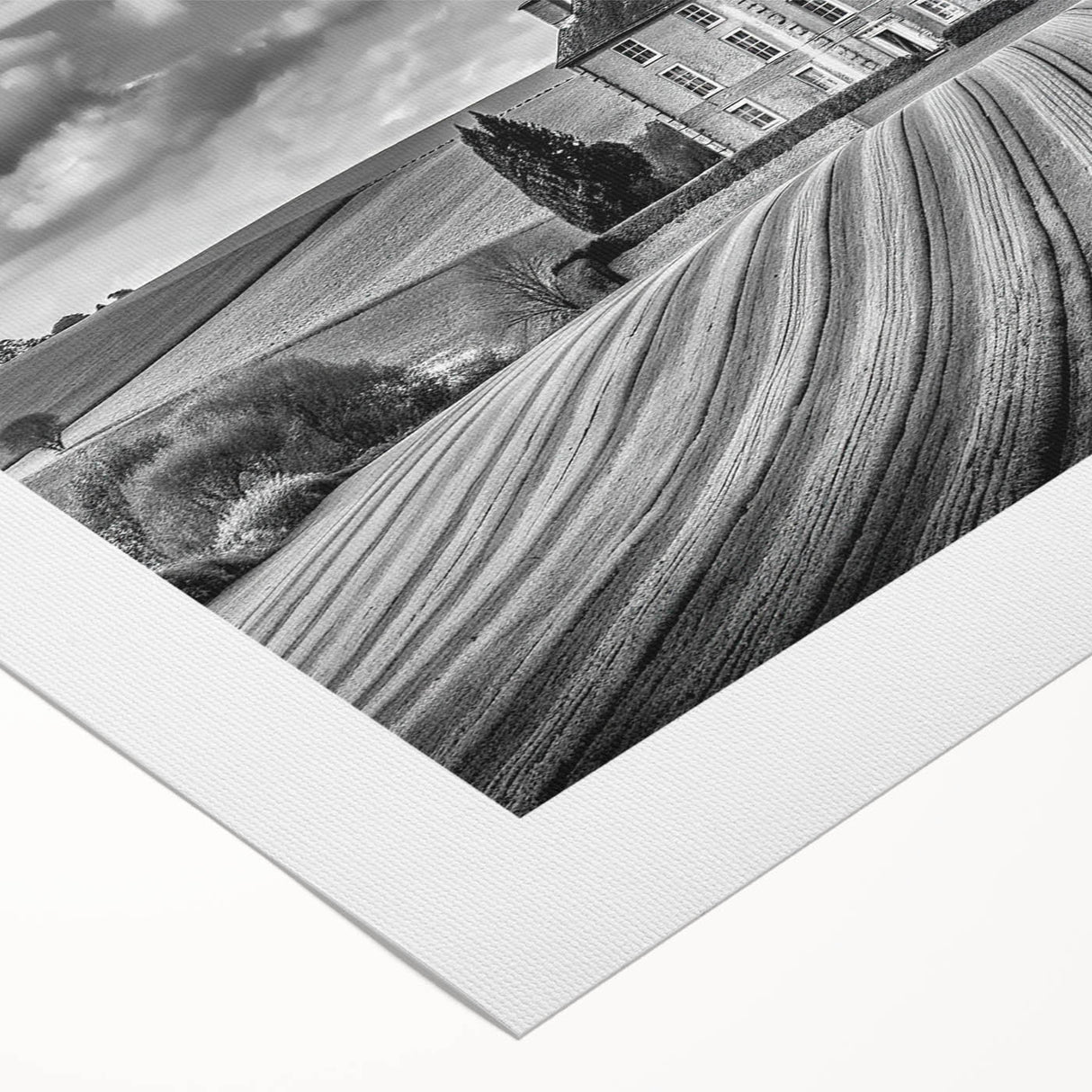 Vibrant countryside landscape wall art on rolled canvas, showcasing lush green fields, a peaceful sky, and rustic farmhouses, perfect for home decor.