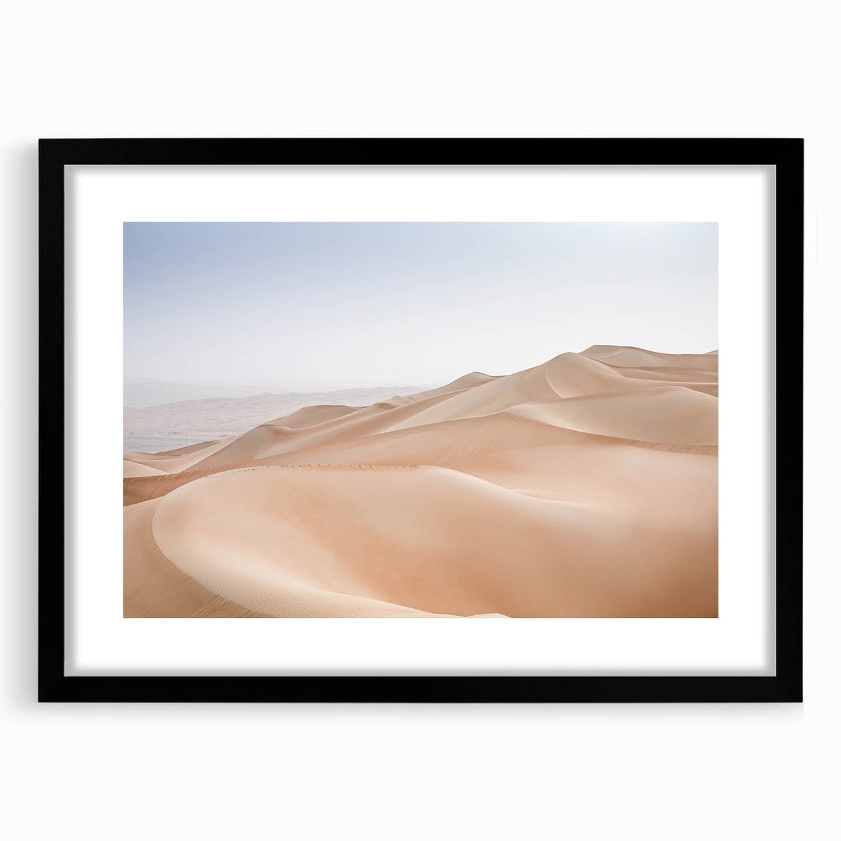 Framed wall art featuring a stunning desert landscape design, with a black frame and matting, perfect for home decor and interior styling. Ideal for enhancing modern aesthetics.