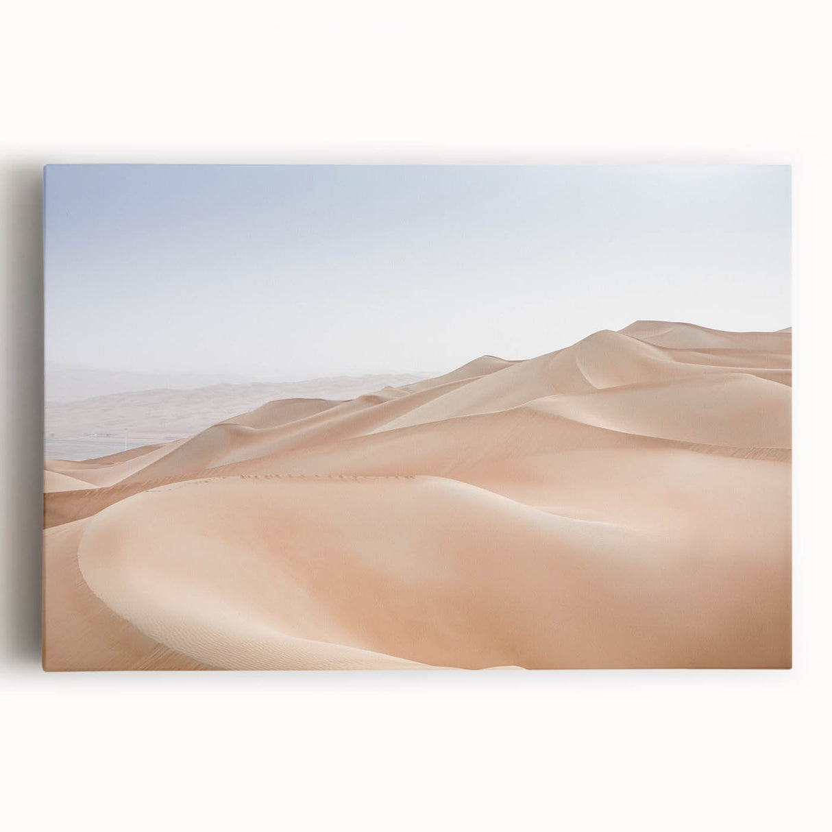 Stretched canvas artwork showcasing a vibrant desert landscape design, featuring warm tones of orange and yellow with intricate details, ideal for home decor.