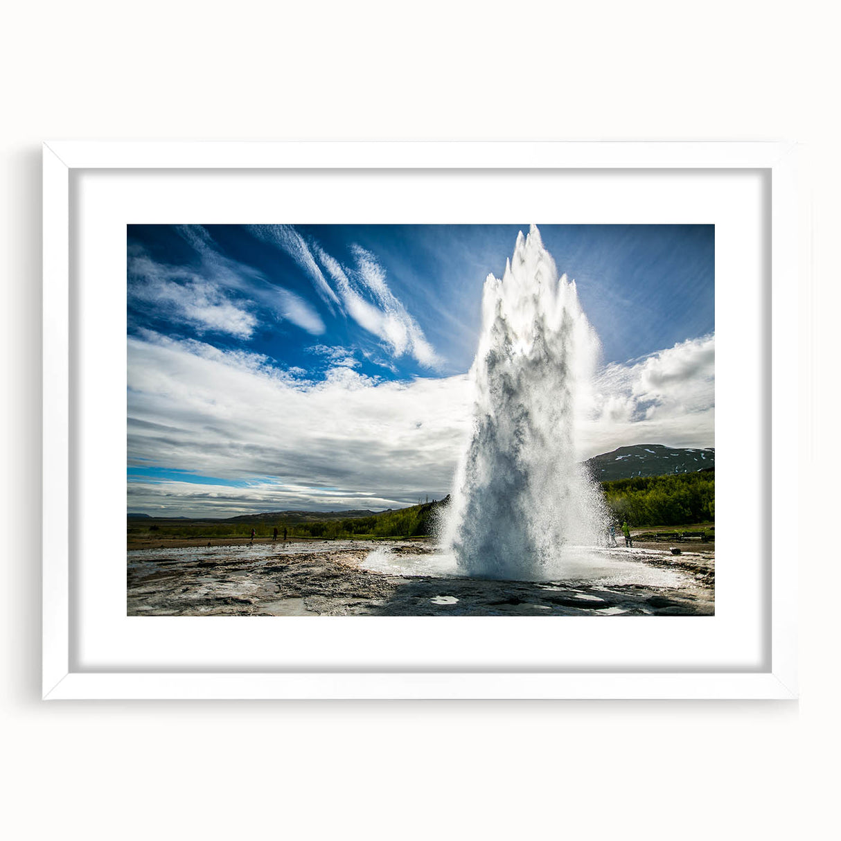 Framed wall art featuring a vibrant geyser landscape design with a white mat, perfect for adding a touch of nature-inspired decor to modern interiors.