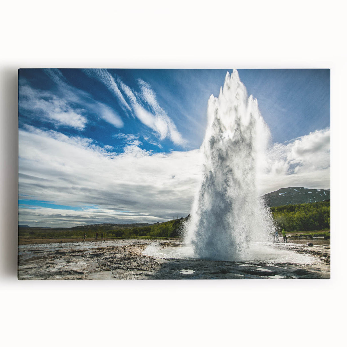 Vibrant stretched canvas artwork depicting a dynamic geyser landscape, showcasing vivid colors and intricate details, perfect for enhancing any room decor.