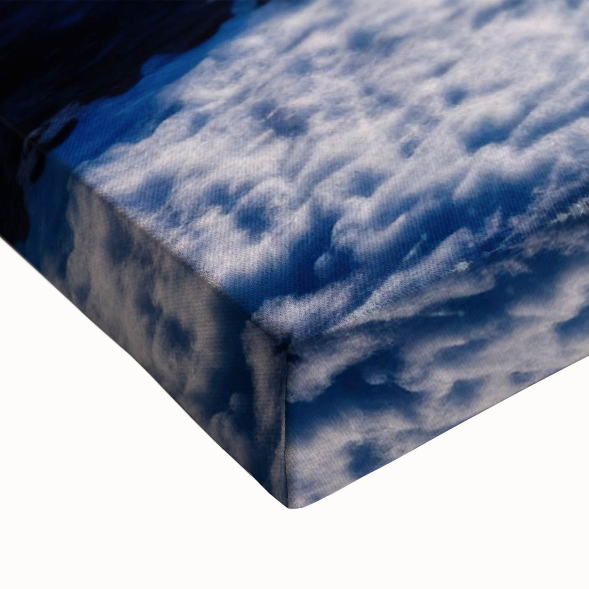 Close-up of a stretched canvas featuring a vibrant geyser landscape design, showcasing rich colors and intricate details, ideal for modern home decor.