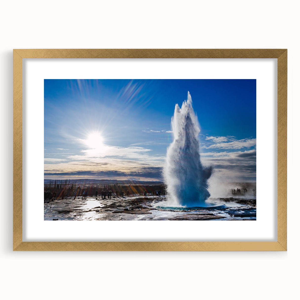 Framed wall art featuring a stunning geyser landscape design with a gold mat, perfect for adding elegance to modern home decor. The piece captures vibrant colors and intricate details, enhancing any room's ambiance.