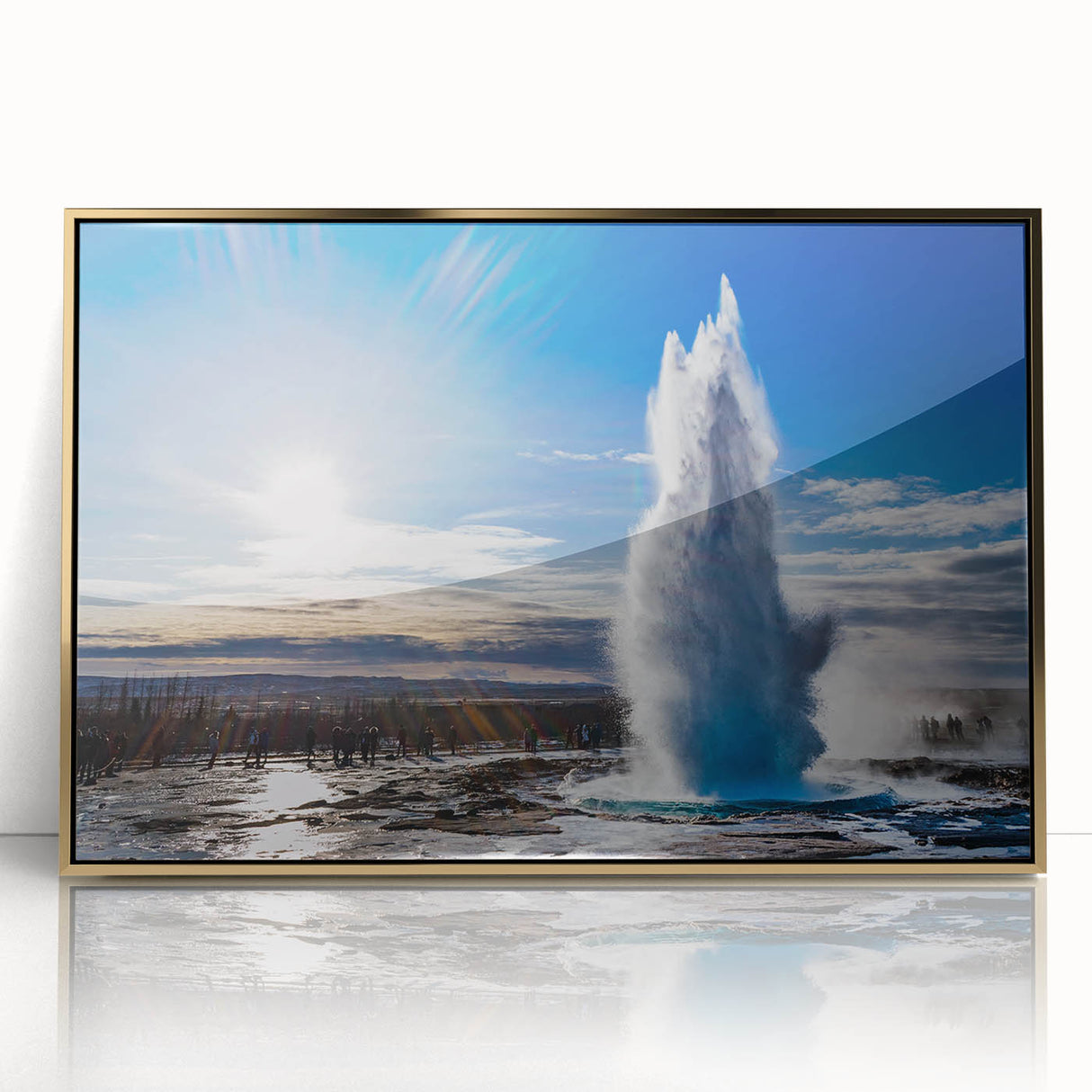 Framed acrylic wall art featuring a stunning geyser design in gold tones, elegantly displayed in a modern frame, perfect for enhancing contemporary interiors.