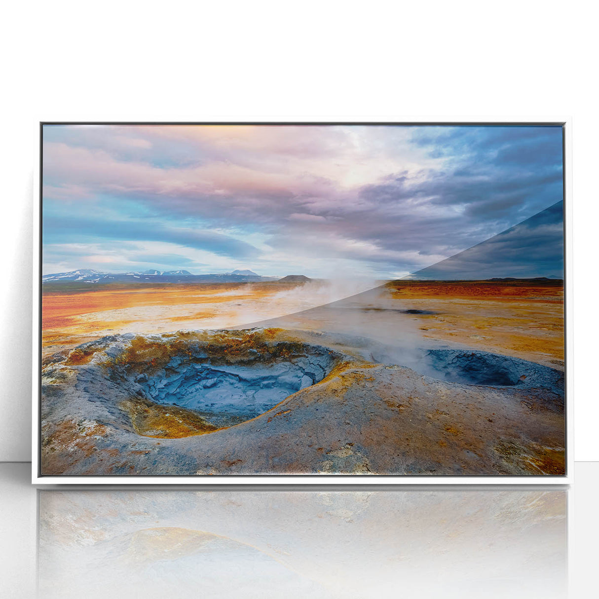 Framed acrylic wall art showcasing a colorful geyser landscape design, featuring vibrant blues and greens, perfect for modern home decor.