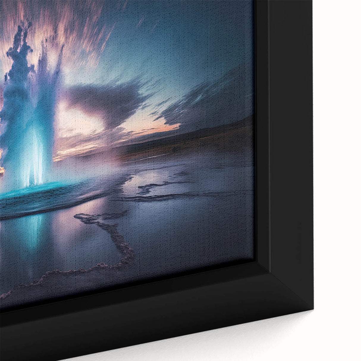 Close-up of a framed canvas wall art featuring a vibrant geyser landscape design, showcasing intricate colors and textures that enhance any room's decor.