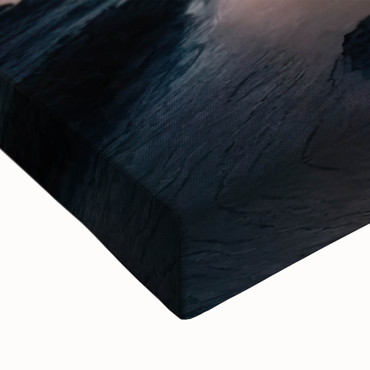 Close-up of a stretched canvas featuring vibrant landscape design with geysers, showcasing intricate details and rich colors, perfect for home decor.