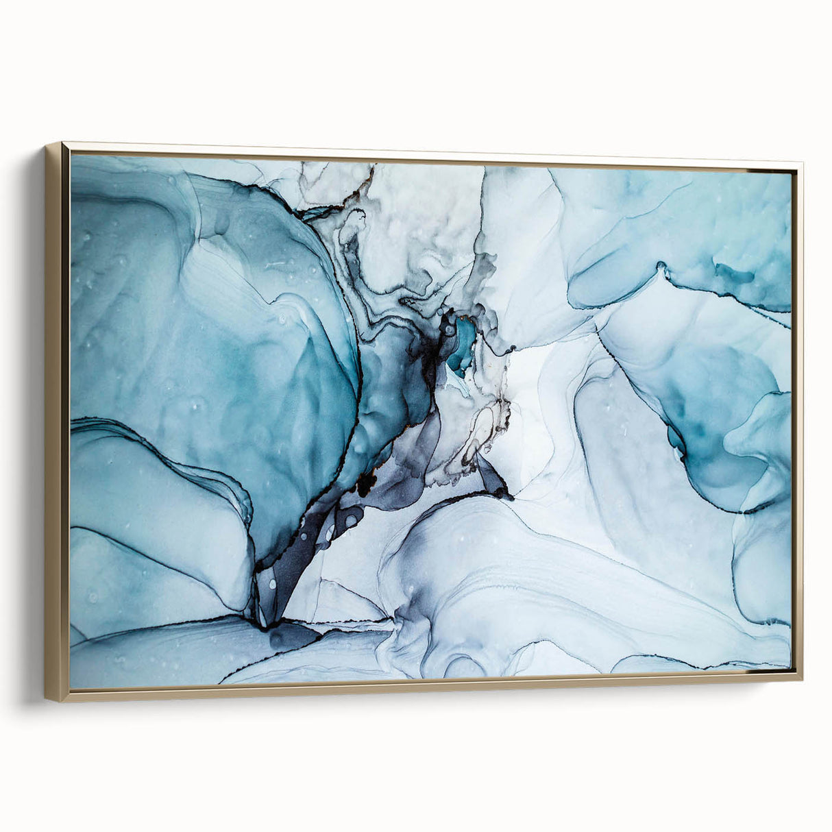 Framed wall art of a stunning glacier landscape design, featuring vibrant blue and white hues, elegantly displayed with a gold frame, perfect for modern home decor.