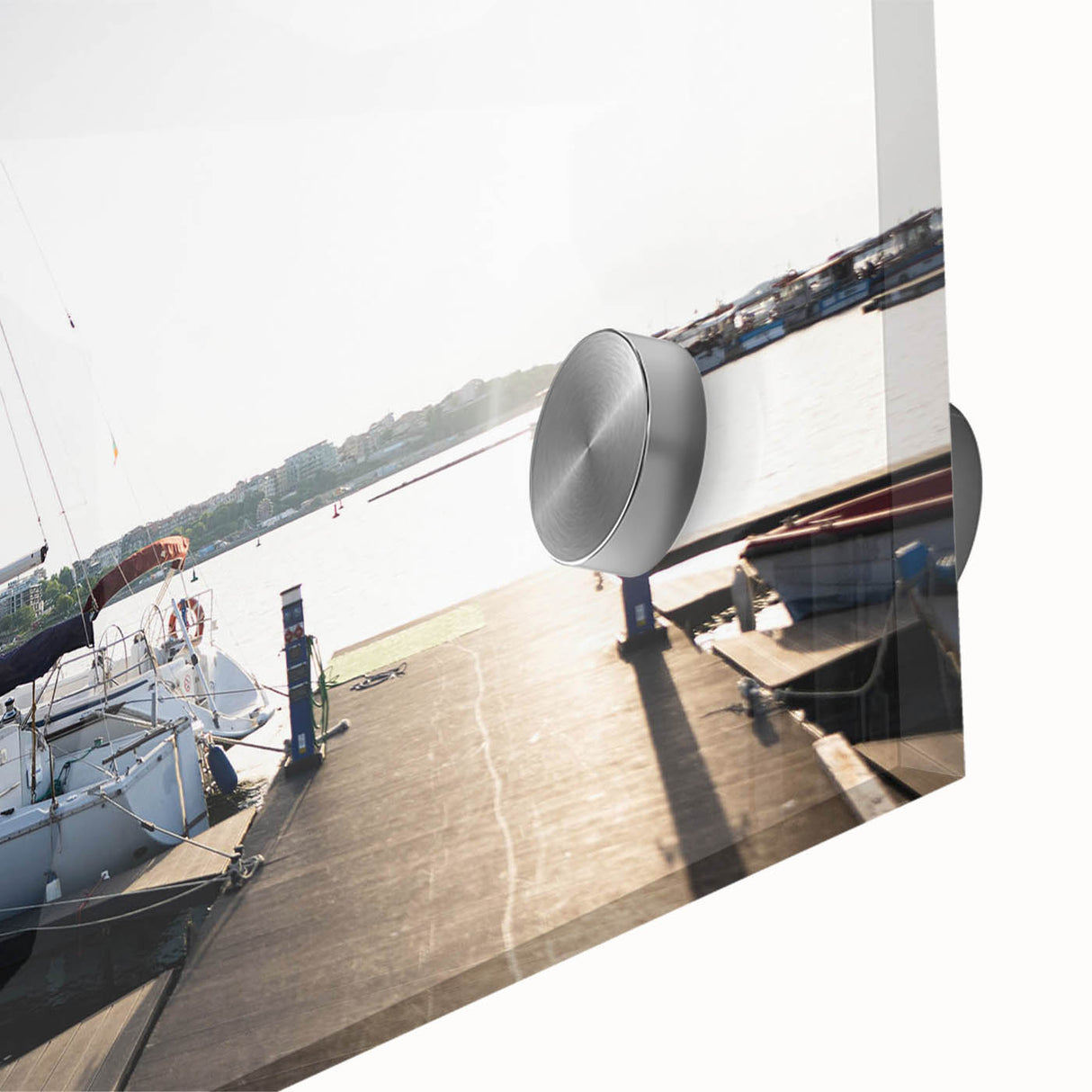 Close-up view of an acrylic glass wall art piece featuring a vibrant harbor landscape design with rich colors, ideal for modern home decor.