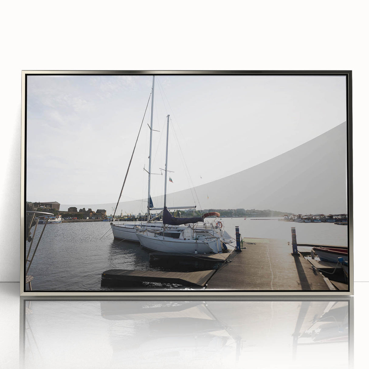 Framed acrylic wall art depicting a serene harbor landscape, showcasing vibrant colors and intricate details, perfect for enhancing home decor.