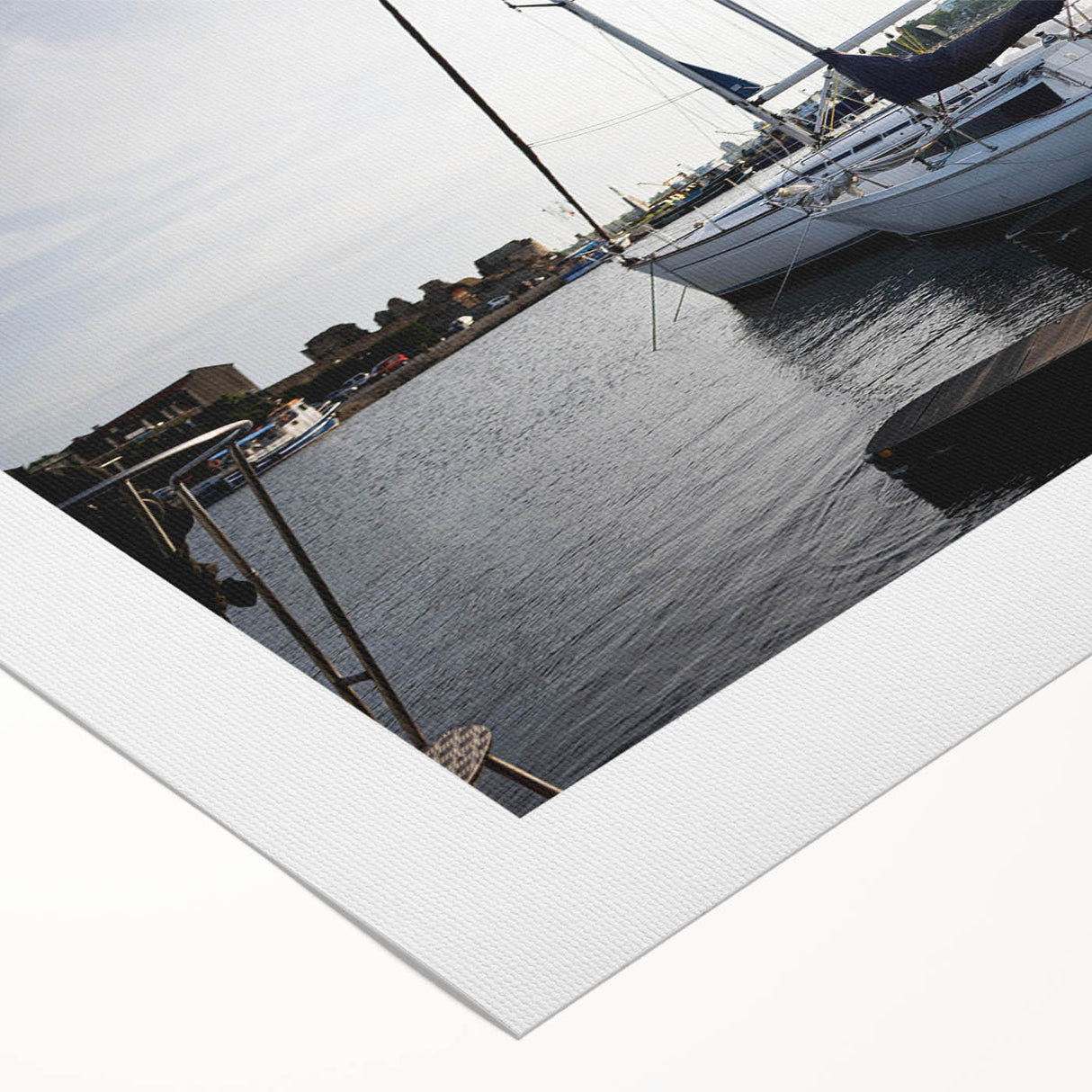 Rolled canvas artwork showcasing a serene harbor landscape, featuring vibrant blues and greens, perfect for enhancing home decor. Packaged securely in a durable tube for delivery.