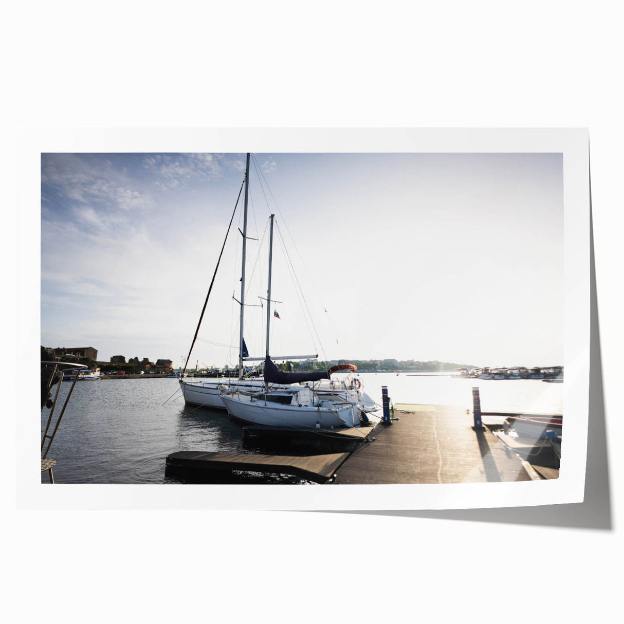 Vibrant rolled print showcasing an abstract harbor landscape in soothing blues and greens, ideal for modern home decor. Perfect for adding a serene touch to any space.