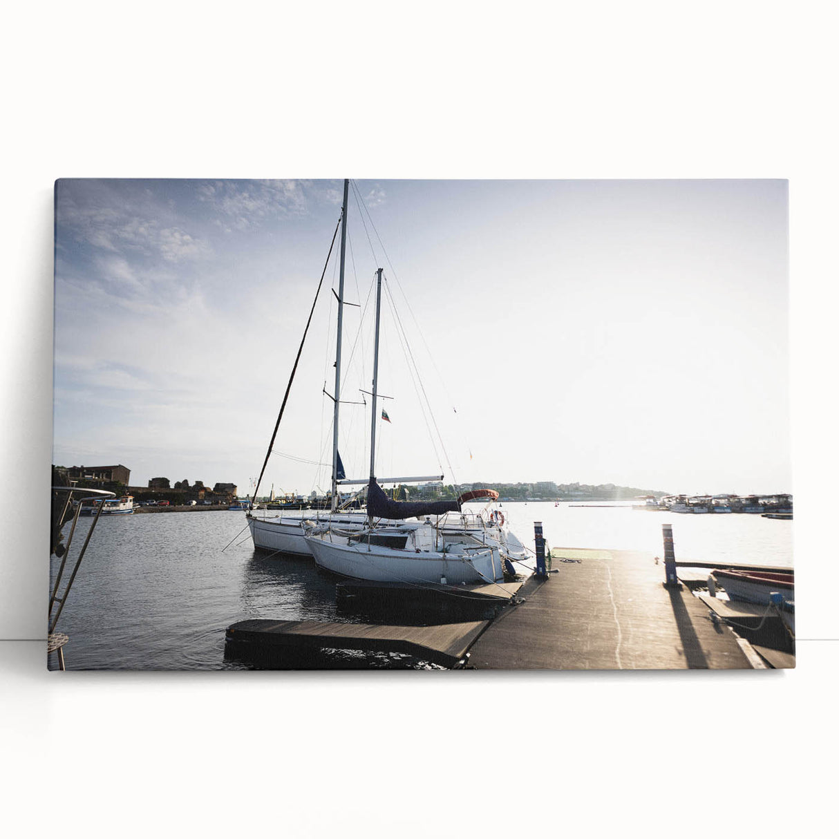 Stretched canvas wall art showcasing a serene harbor landscape design, featuring vibrant blues and greens, ideal for modern home decor. Perfect for adding tranquility to living spaces.