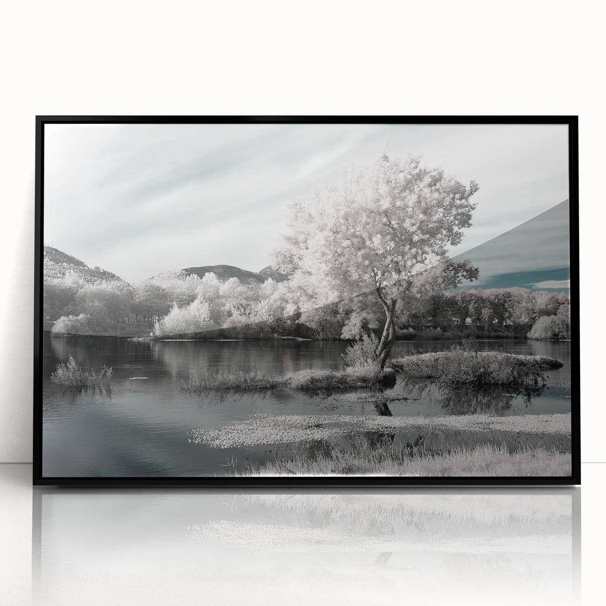 Framed wall art showcasing a serene lake landscape with vibrant blue and green hues, designed to enhance home decor and create a calming atmosphere. Perfect for nature enthusiasts, this acrylic piece adds elegance and tranquility to any room.