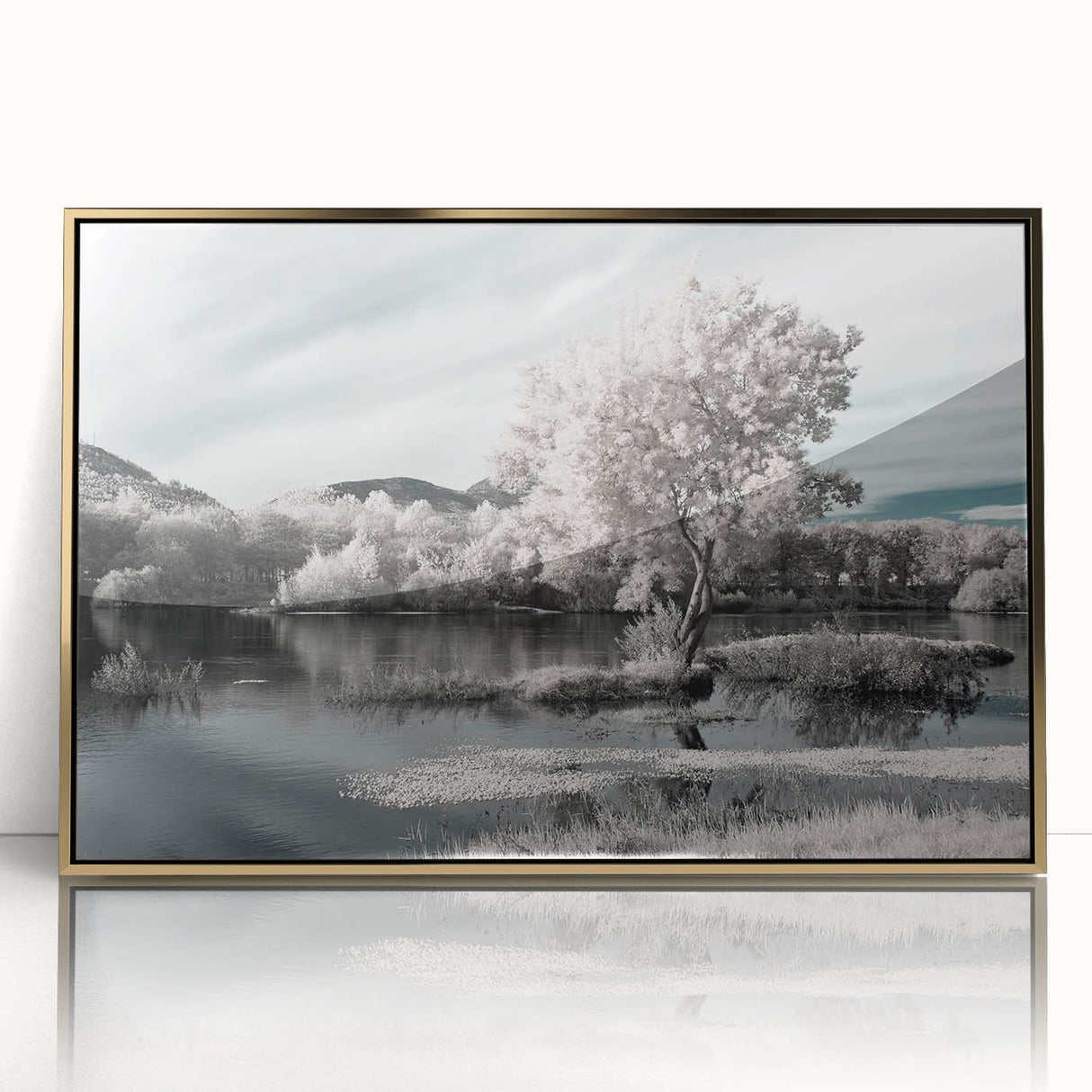 Framed wall art featuring a serene lake landscape with vibrant colors and gold acrylic frame, perfect for enhancing modern home decor aesthetics. This piece adds a touch of tranquility to any living space.