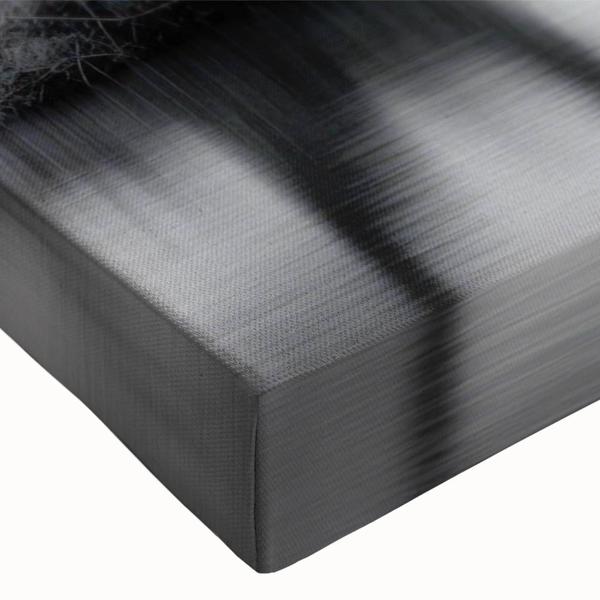 Close-up of a stretched canvas wall art piece depicting a serene lake landscape, featuring vibrant blues and greens that evoke tranquility and nature's beauty. Perfect for home decor, this piece enhances any living space with a calming ambiance.