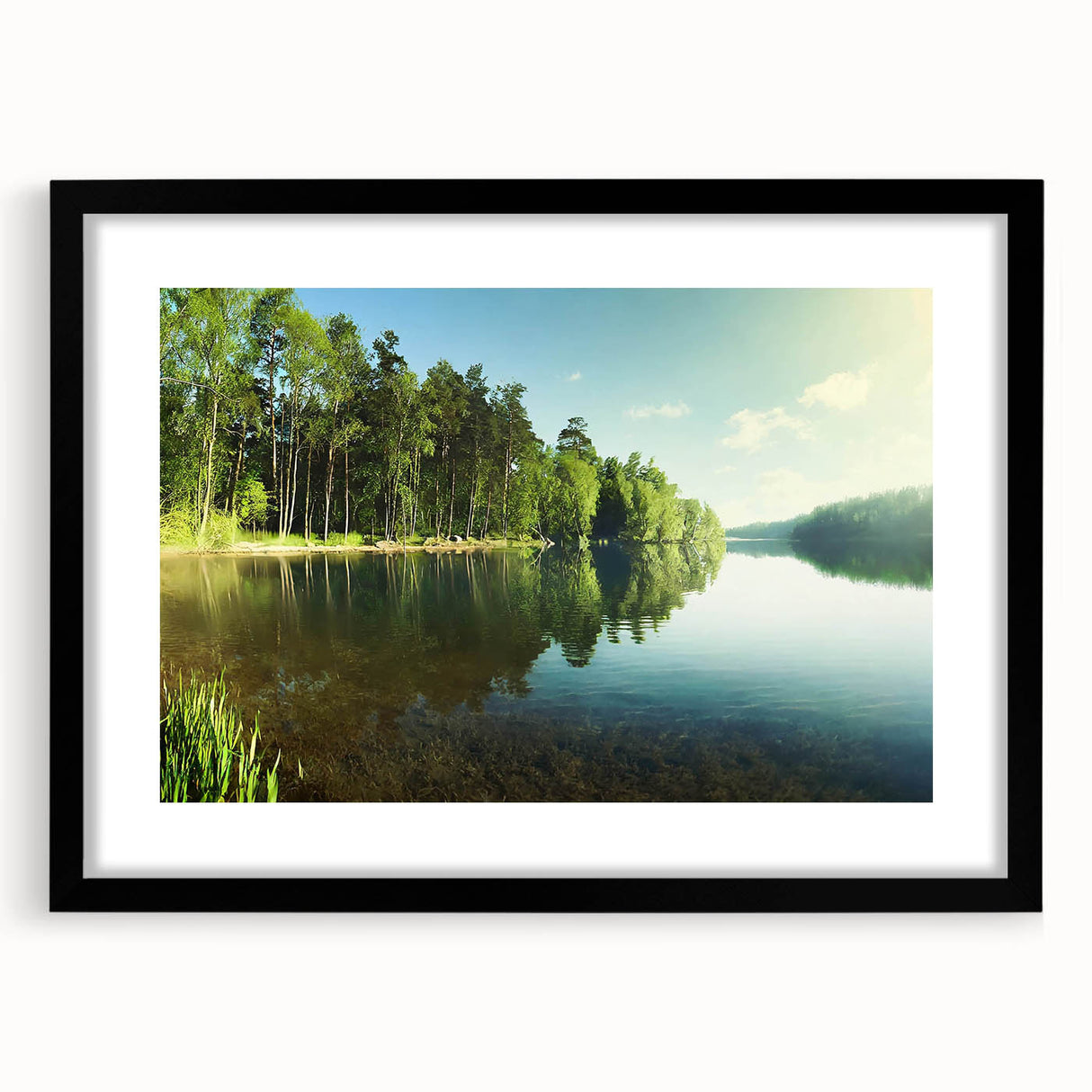 Framed wall art showcasing a serene lake landscape with vibrant colors and intricate details, featuring a sleek black frame and white mat for a modern touch.