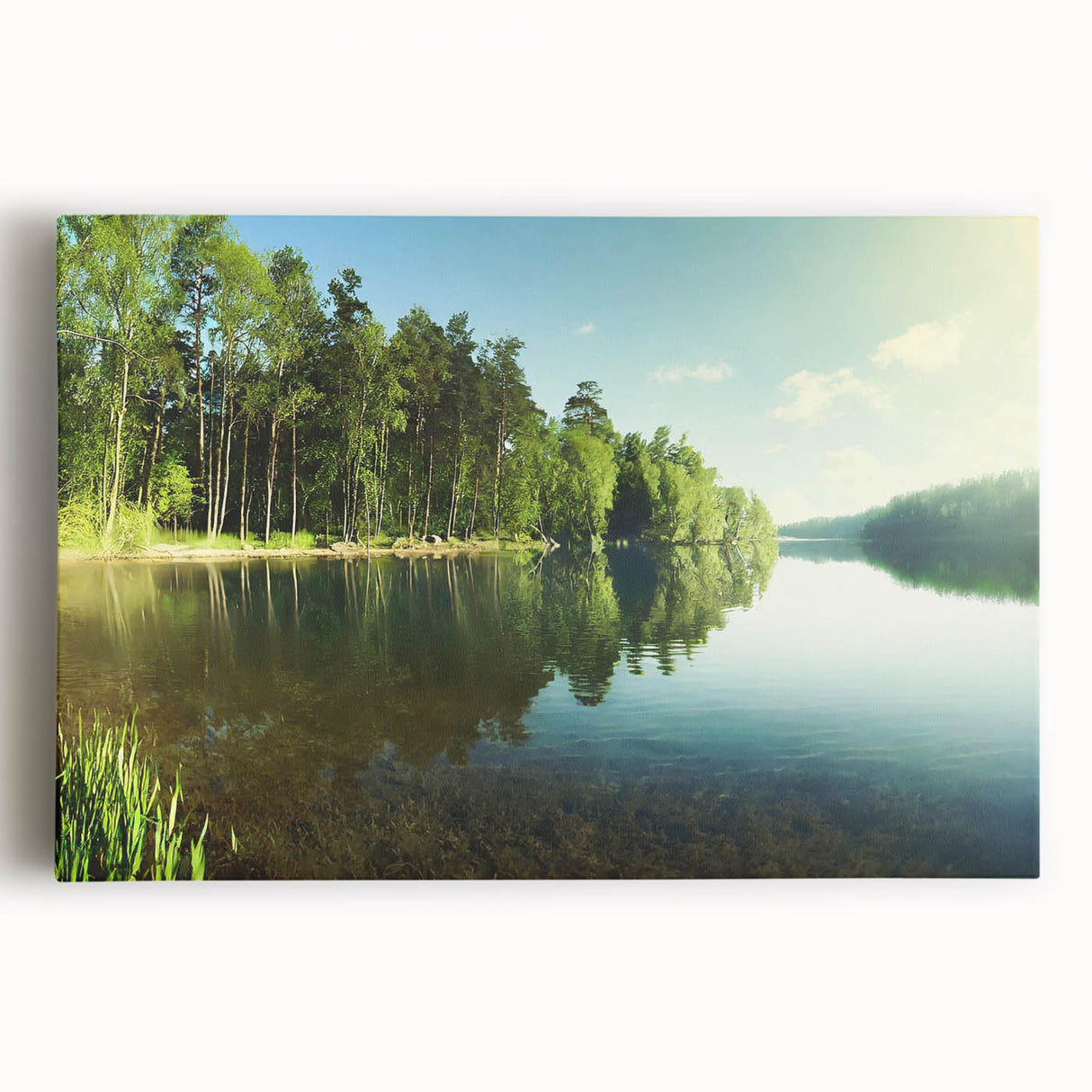 Stretched canvas artwork showcasing a serene lake landscape with vibrant colors and detailed reflections, perfect for enhancing home decor and creating a tranquil atmosphere.