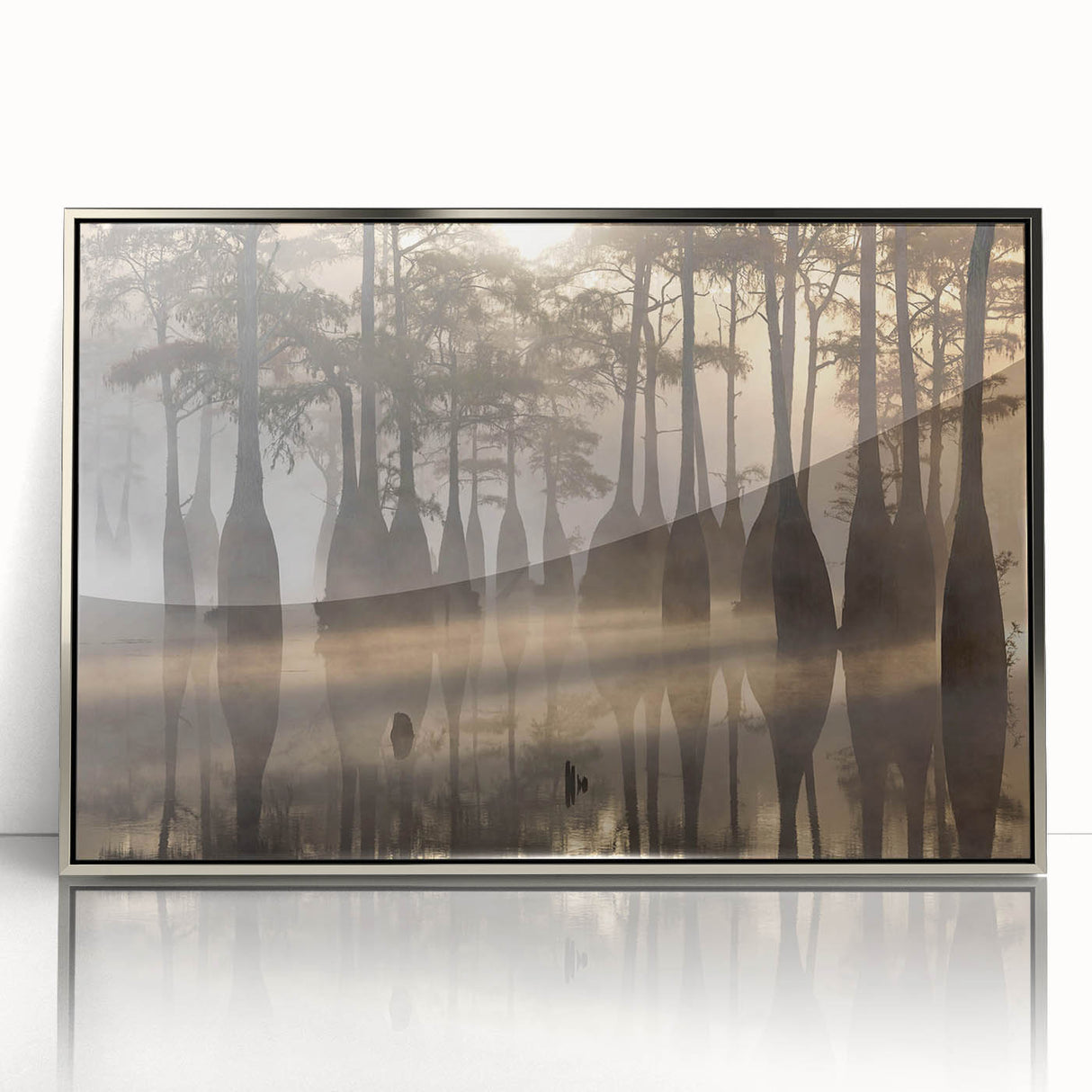 Framed wall art depicting a serene marsh landscape with vibrant greenery and soft reflections in water, elegantly designed in a silver frame for modern decor.