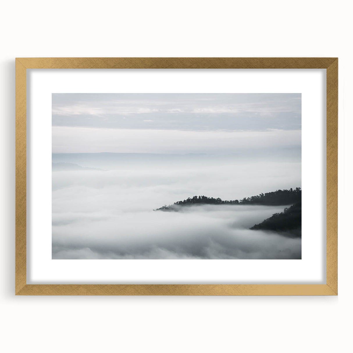 Framed wall art collection featuring a misty landscape design with a gold mat, ideal for modern home decor. The artwork presents a serene, foggy scene that adds elegance to any room.
