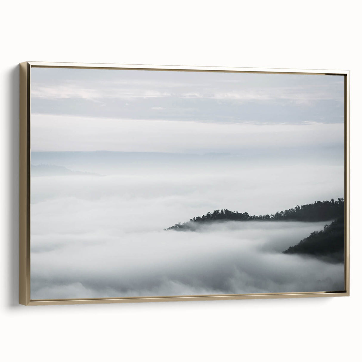 Framed canvas wall art showcasing a misty landscape design with foggy hues, accented by a gold frame; perfect for enhancing home decor with a serene ambiance.