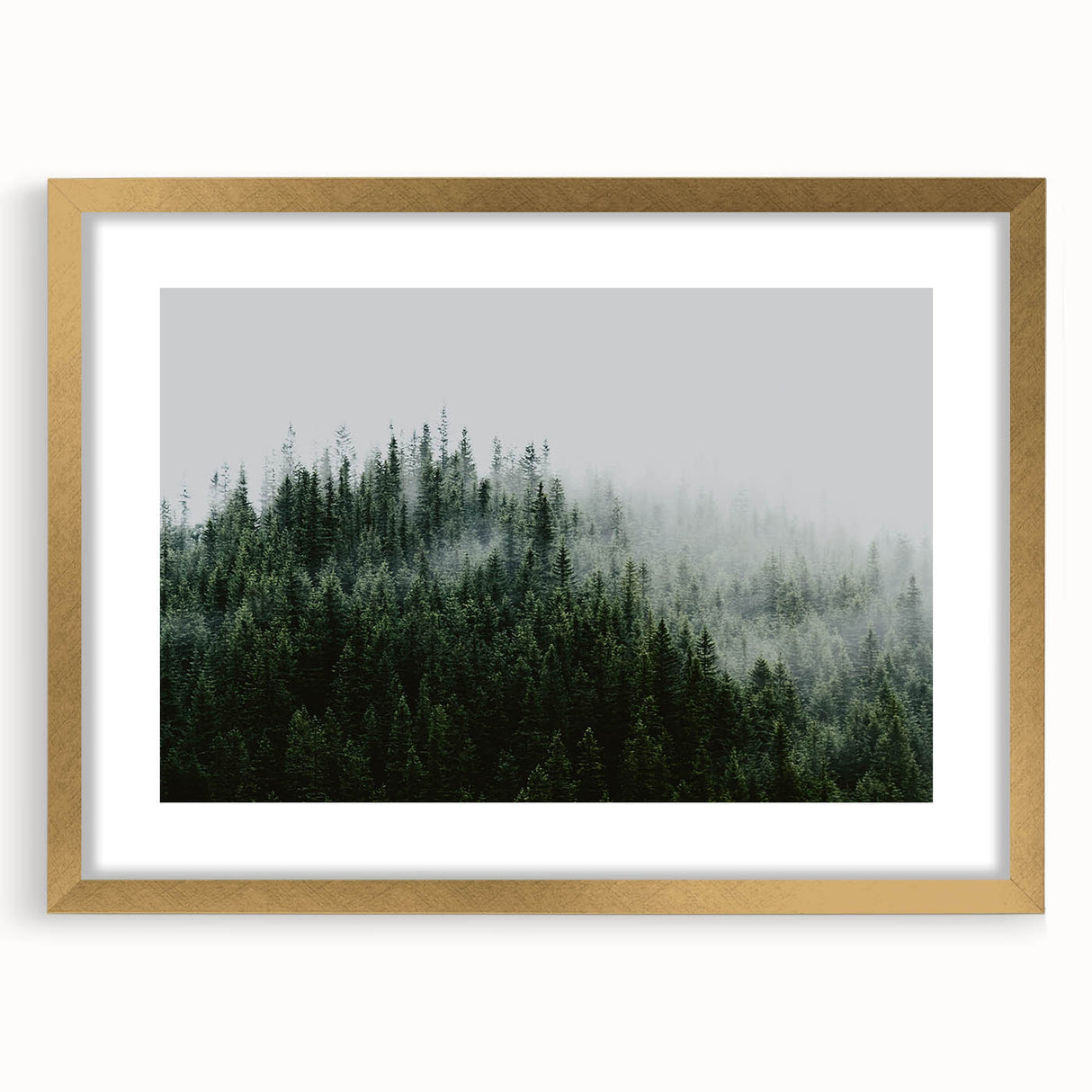 Framed wall art featuring a misty landscape design with fog and soft hues, elegantly presented with a gold frame and mat, perfect for enhancing home decor.