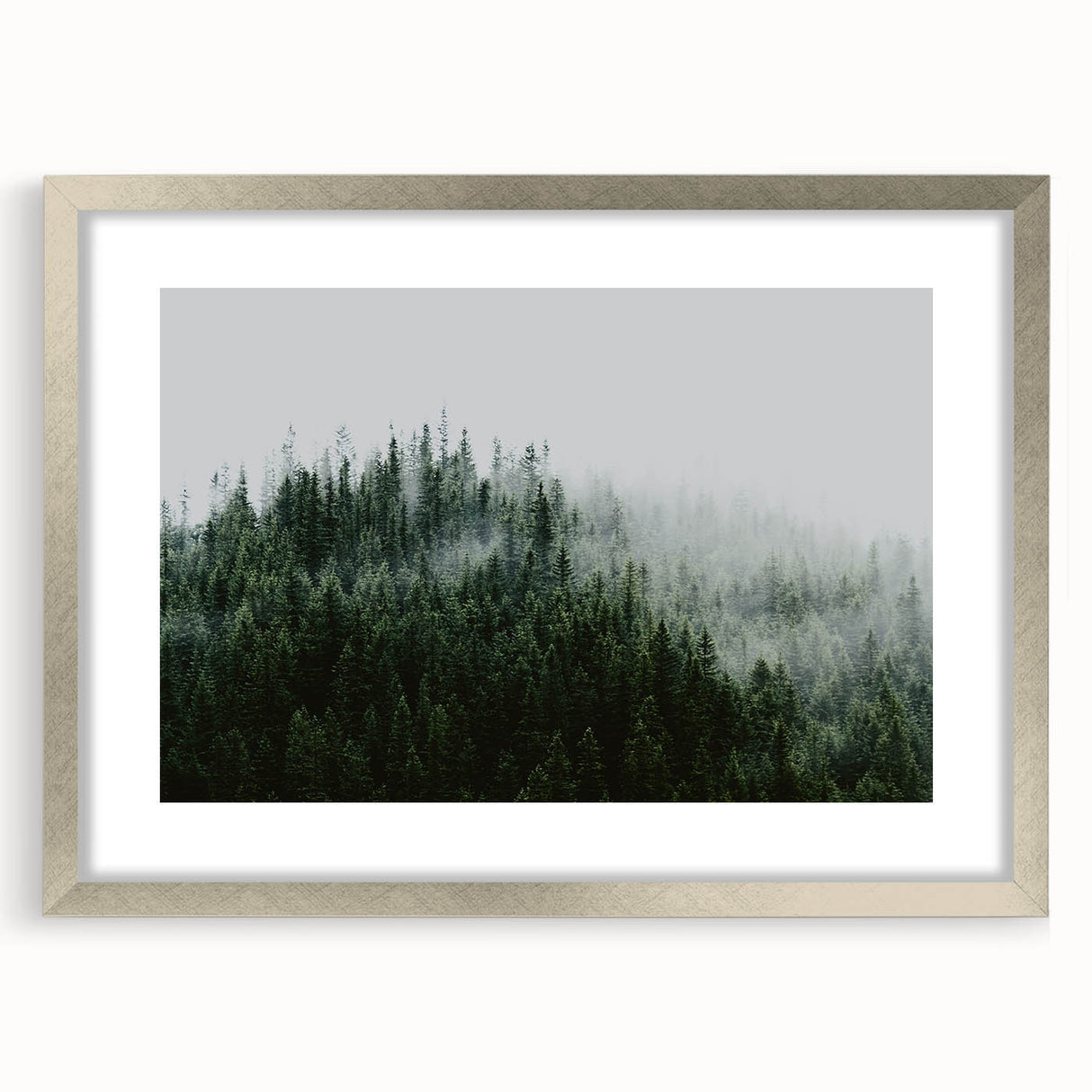 Framed wall art collection showcasing a serene misty landscape design with soft gray and silver tones, set in a sleek silver frame with a white mat. Perfect for home decor.