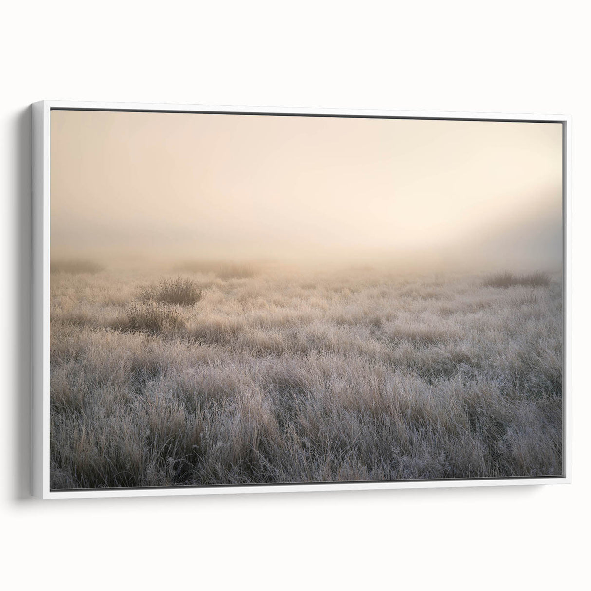 Framed canvas wall art showcasing a serene landscape design with mist and fog, featuring soft hues of gray and white, ideal for modern home decor.
