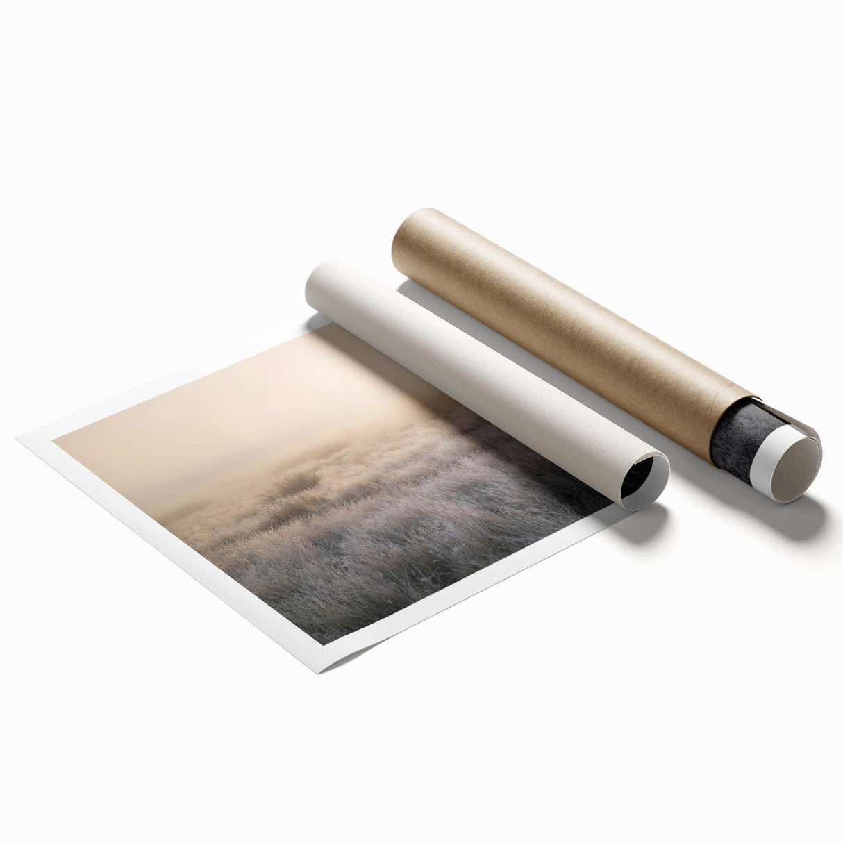 Rolled print of a serene landscape featuring misty mountains and fog, showcasing soft color gradients in blues and grays, perfect for home decor.