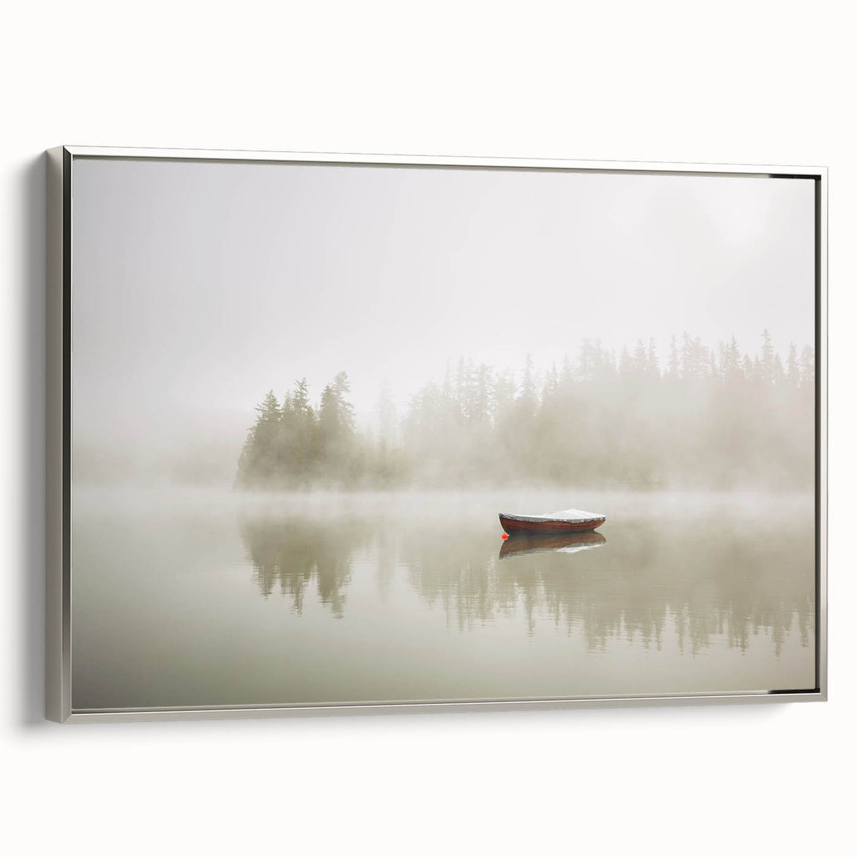 Framed canvas wall art showcasing a serene landscape design with mist and fog, featuring a sleek silver frame, ideal for modern home decor. Perfect for adding tranquility to any room.