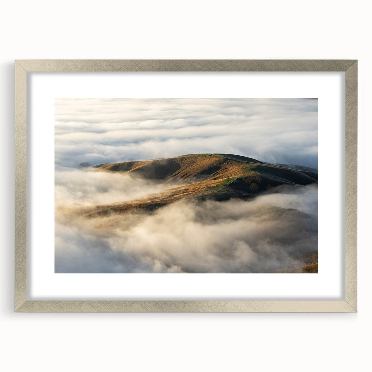 Framed wall art collection titled "Landscapes Mist & Fog," showcasing serene nature scenery with soft gray and white tones, elegantly presented with a silver frame and mat for a sophisticated look. Ideal for enhancing home decor with a calming atmosphere.