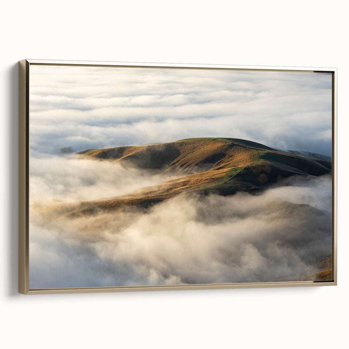 Framed canvas wall art featuring a serene landscape design with mist and fog, accented by a gold frame, perfect for enhancing home decor with a touch of elegance.