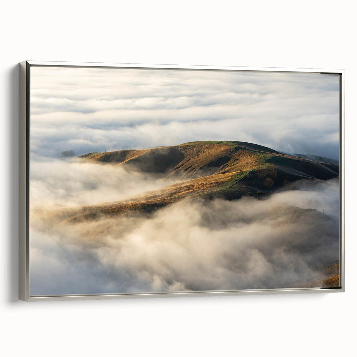 Framed canvas wall art showcasing a serene landscape design with misty fog in soft gray and blue tones, elegantly displayed in a silver frame for modern decor.