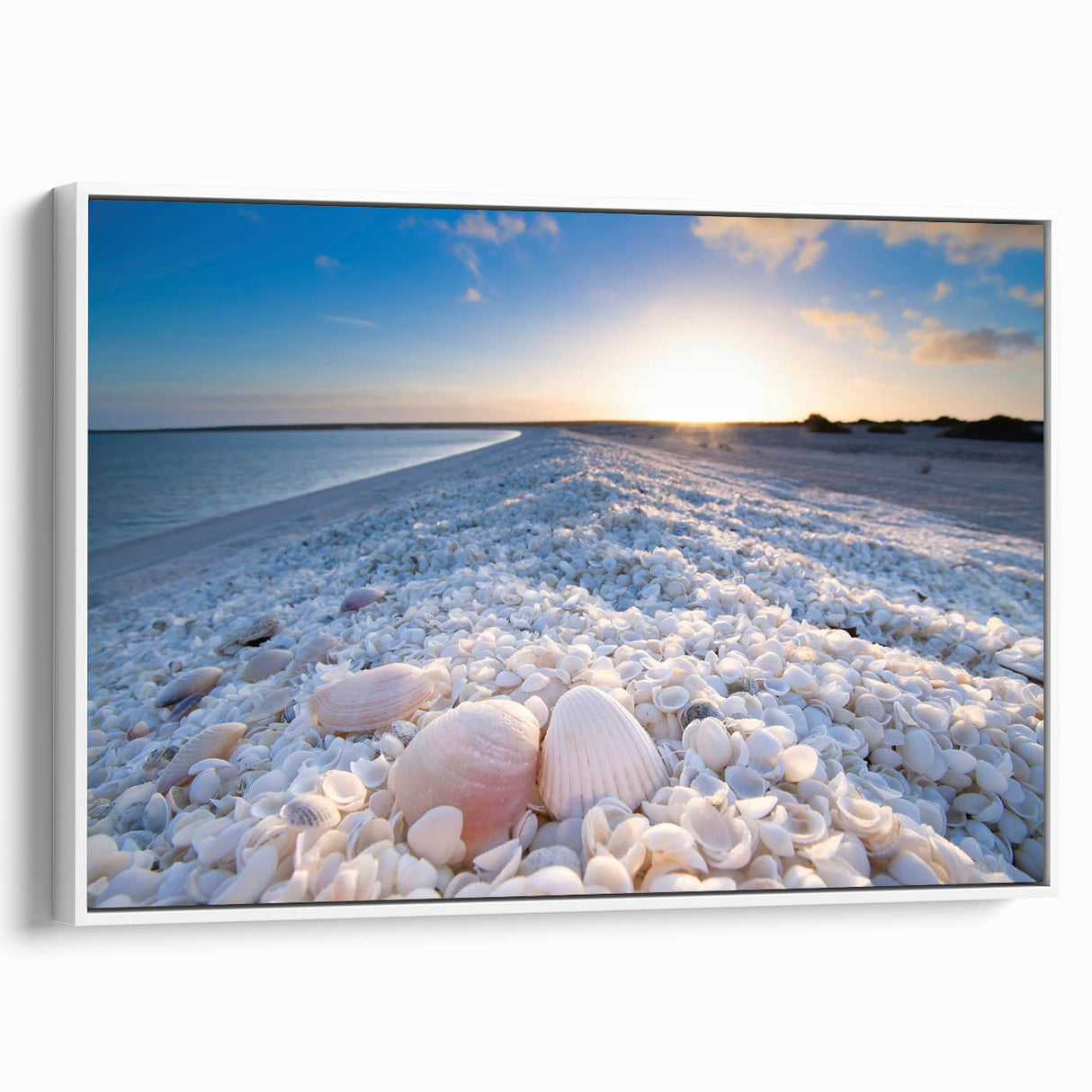 Framed canvas wall art collection showcasing serene seascapes and landscapes in a modern design, featuring a sleek white frame and side view display.