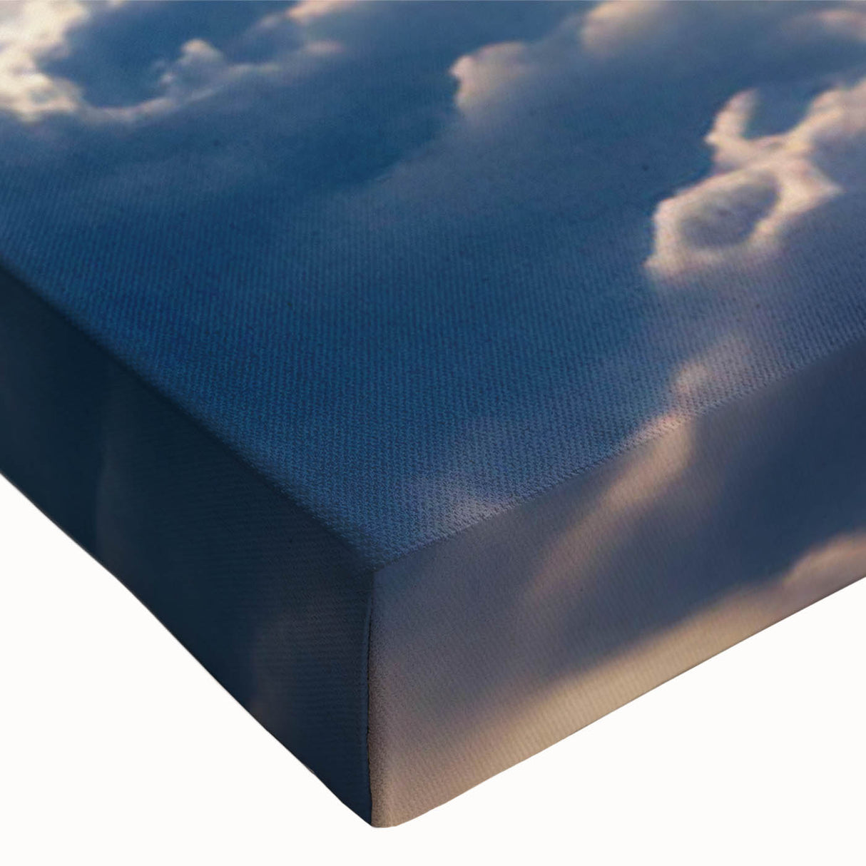 Close-up of a stretched canvas wall art piece showcasing a vibrant landscape and skyscape design, featuring rich colors and intricate details, perfect for home decor.