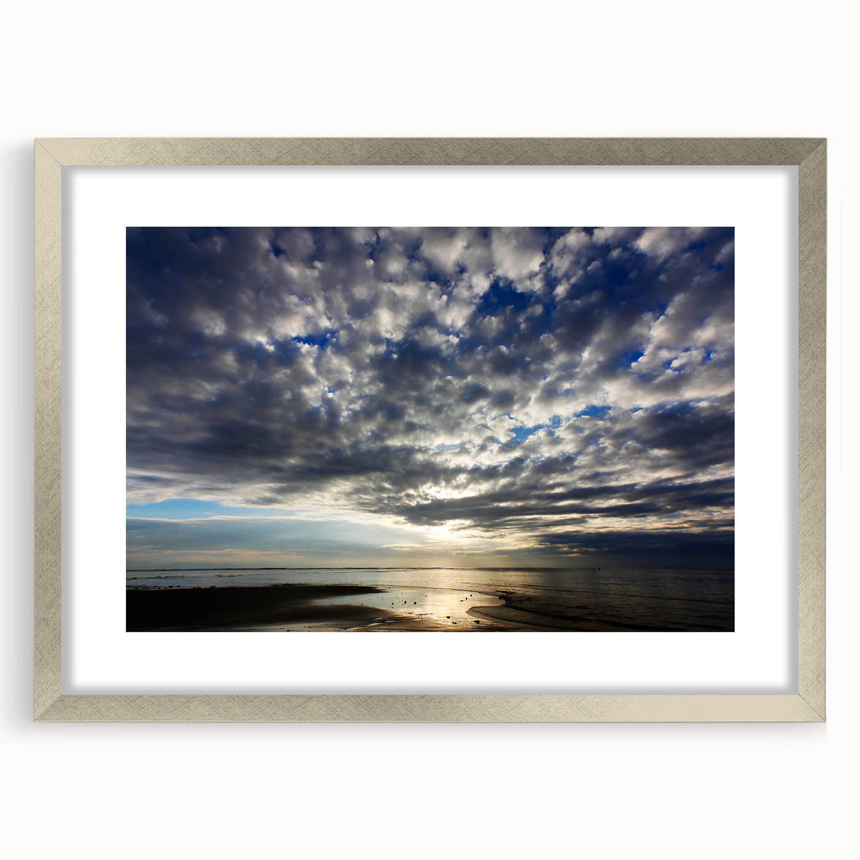 Framed wall art collection showcasing a serene landscape with vibrant colors and intricate details, presented in a sleek silver frame with matting, perfect for home decor.