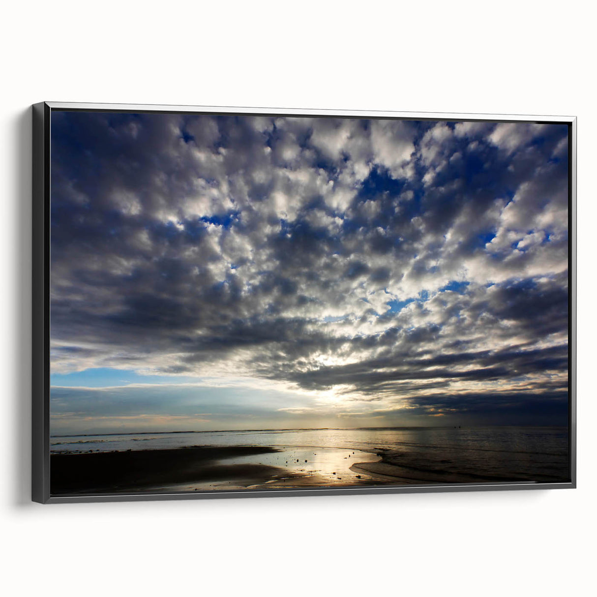 Framed canvas wall art featuring a serene landscape with vibrant colors and dynamic skyscape, showcased in a sleek black frame from the Landscapes Skyscapes collection.