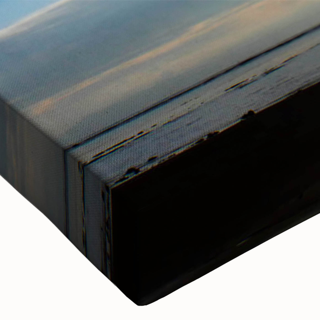 Close-up of a vibrant stretched canvas featuring a serene landscape with soft hues of blue and green, part of a collection designed to enhance home decor.