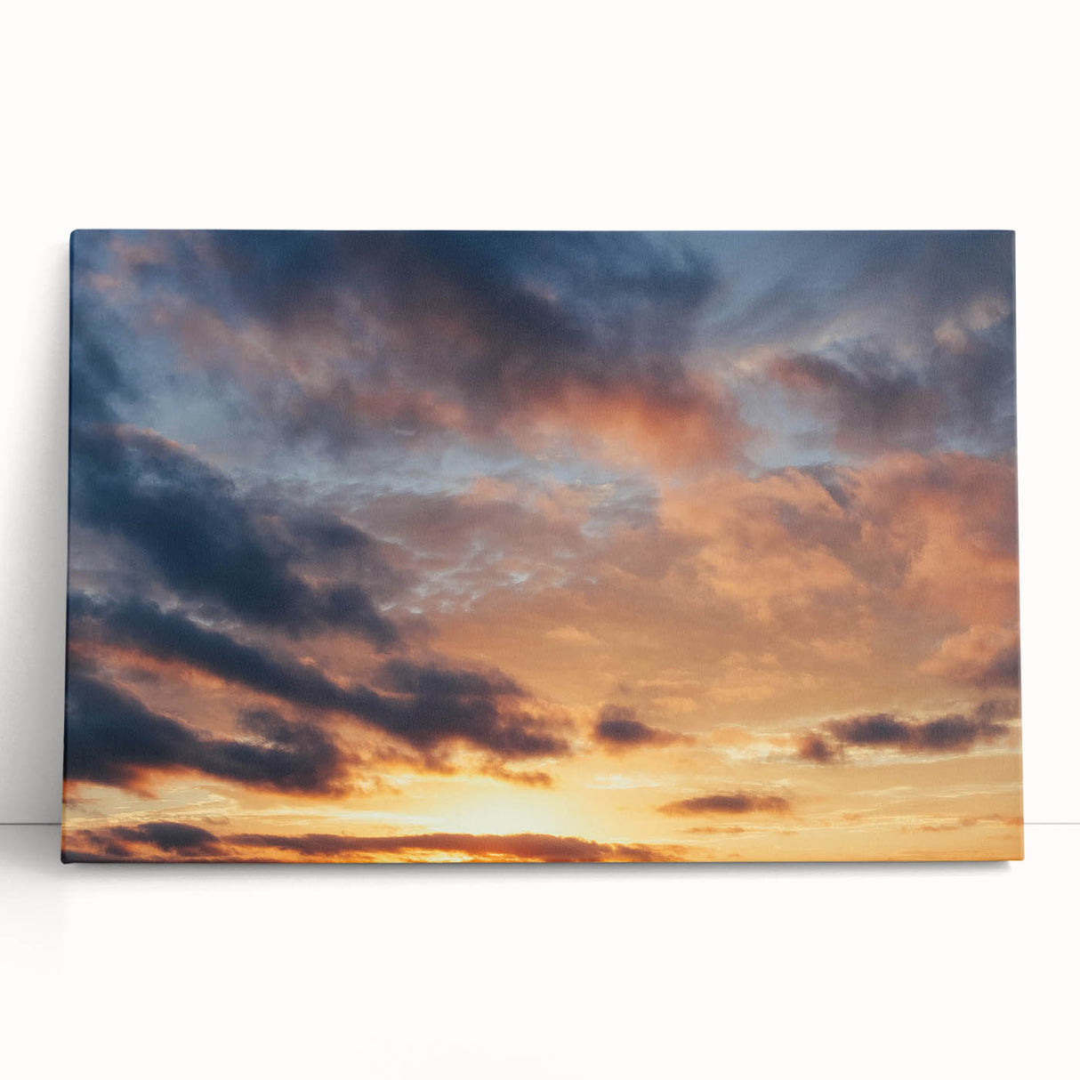Stretched canvas wall art showcasing a serene landscape with vibrant colors, featuring a sunset over rolling hills, perfect for home decor and relaxation.
